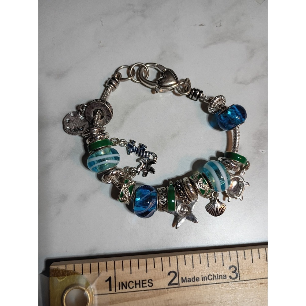 ocean themed aqua blue turquoise color charm bracelet 6.5"